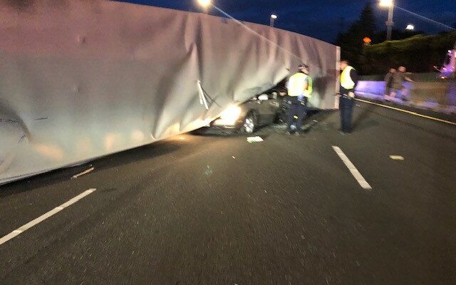 Semi-Tractor Trailer Lands On Top Of Car On I-5