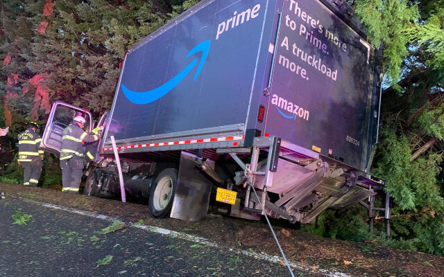 Amazon Truck Slides Off Redland Road, Passenger Injured